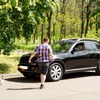 6721468 pretty females pulling pushing a broken down car