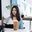 Woman writing in notebook in office 23 2147707786